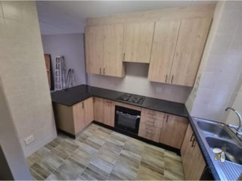 Sonneveld Brakpan property for sale, 2 bedroom ground floor unit Brakpan, townhouse with patio Sonneveld, Chas Everitt Brakpan