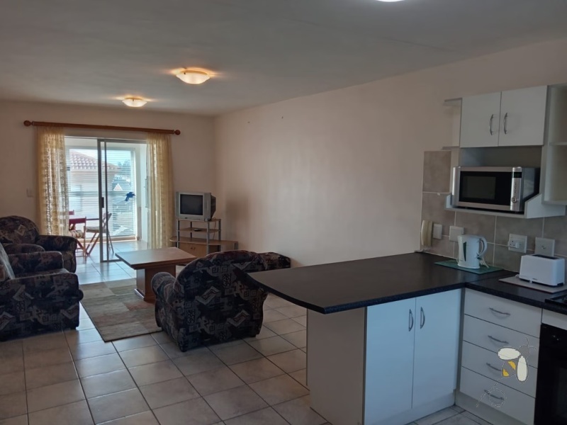 Hartenbos holiday apartment, self-catering Hartenbos, 2 bedroom holiday unit, Hartenbos Central rental, fully furnished apartment, holiday accommodation with Wi-Fi, private braai area.