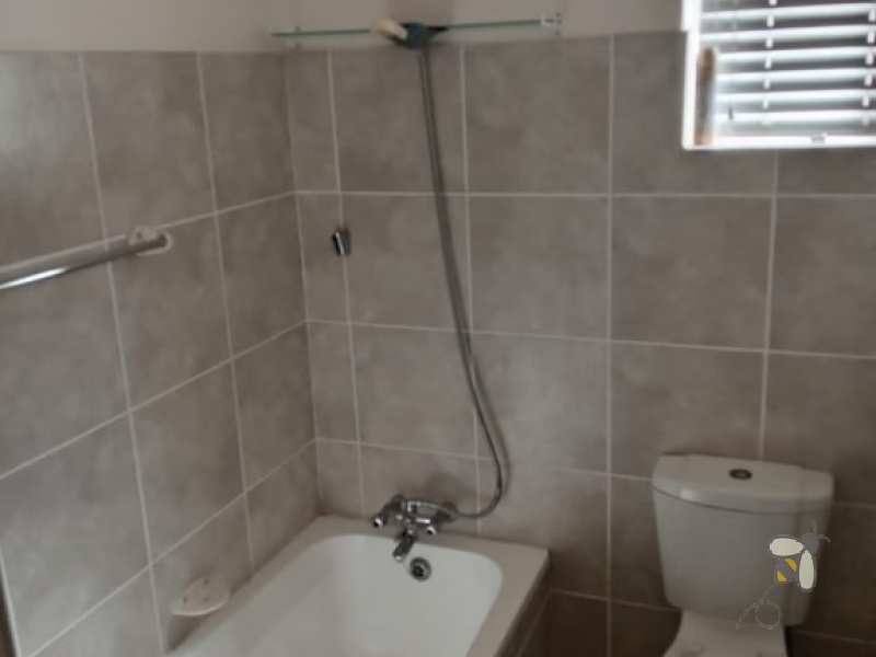 Hartenbos holiday apartment, self-catering Hartenbos, 2 bedroom holiday unit, Hartenbos Central rental, fully furnished apartment, holiday accommodation with Wi-Fi, private braai area.