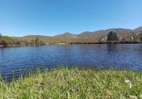 Ruiterbos farm for sale, Mossel Bay Fynbos farm, Attaquaskloof Nature Reserve property, adventure lodge for sale, conference venue Mossel Bay, 4x4 trails farm, self-catering accommodation investment, Khoisan rock art.