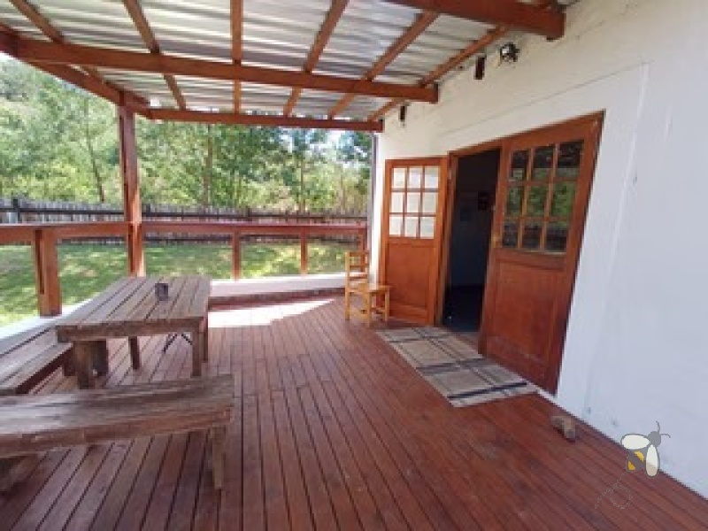 Oudtshoorn guest farm for sale, Swartberg mountains property, Cango Caves tourism investment, farm with accommodation, solar water system farm, tame wildlife property, furnished guest farm.