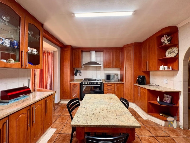 4 bedroom house for sale Dersley, Springs family home, house with sunroom and study, spacious yard property Springs, modern kitchen Dersley, house with multiple living areas.