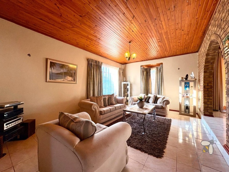 4 bedroom house for sale Dersley, Springs family home, house with sunroom and study, spacious yard property Springs, modern kitchen Dersley, house with multiple living areas.