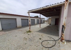 Industrial property for sale Standerton, workshop with 5 garages, Stanfield Hill commercial property, industrial property with water tanks and pump, commercial property with canopies.