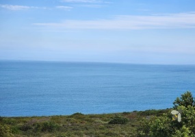 Vacant land Village on Sea Mossel Bay, 979m2 stand with ocean views, secure estate land for sale, coastal property for sale Western Cape, prestigious estate land.