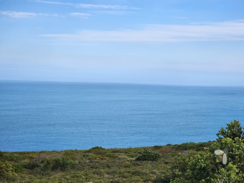 Vacant land Village on Sea Mossel Bay, 979m2 stand with ocean views, secure estate land for sale, coastal property for sale Western Cape, prestigious estate land.