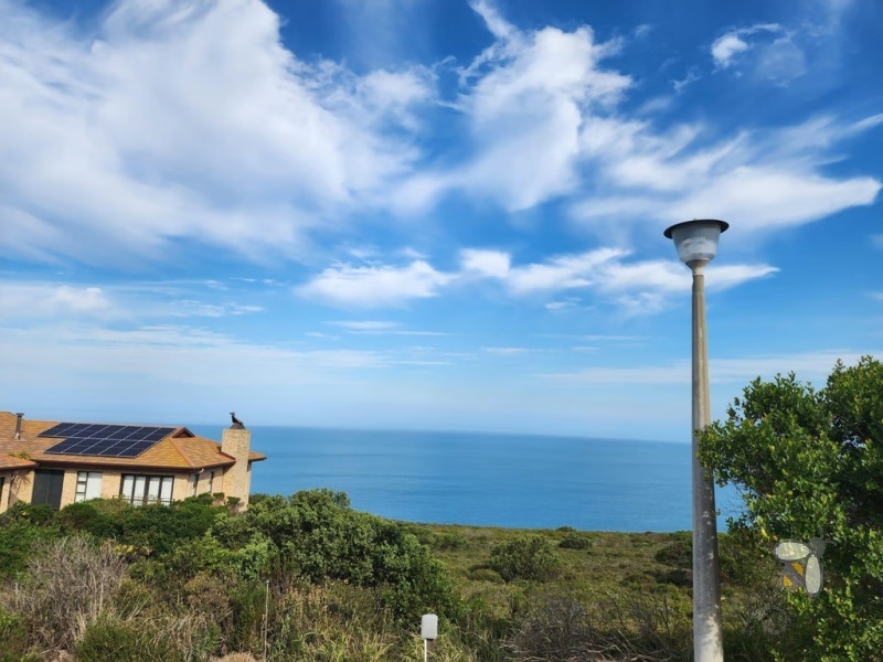 Vacant land Village on Sea Mossel Bay, 979m2 stand with ocean views, secure estate land for sale, coastal property for sale Western Cape, prestigious estate land.