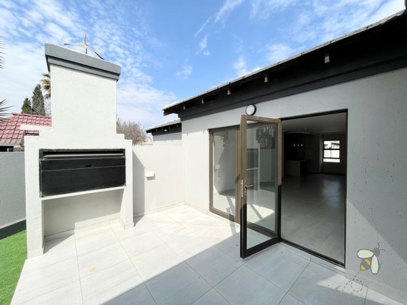 4 bedroom house to let Secunda estate, secure estate rental Secunda, modern family home for rent, rental with double garage and braai area, 24-hour access control property.