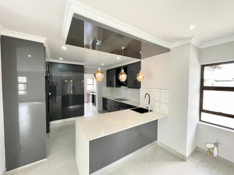 4 bedroom house to let Secunda estate, secure estate rental Secunda, modern family home for rent, rental with double garage and braai area, 24-hour access control property.