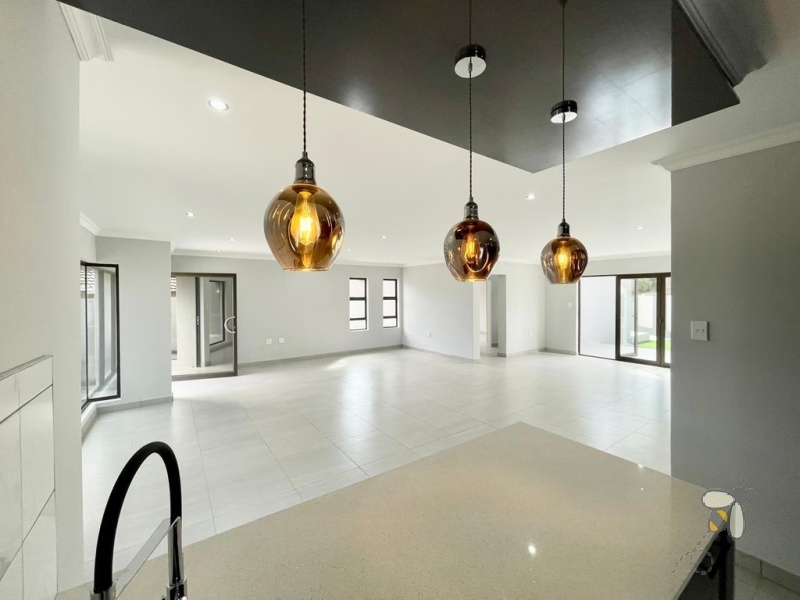 4 bedroom house to let Secunda estate, secure estate rental Secunda, modern family home for rent, rental with double garage and braai area, 24-hour access control property.