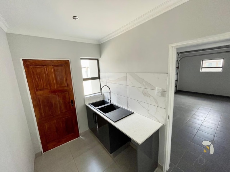 4 bedroom house to let Secunda estate, secure estate rental Secunda, modern family home for rent, rental with double garage and braai area, 24-hour access control property.
