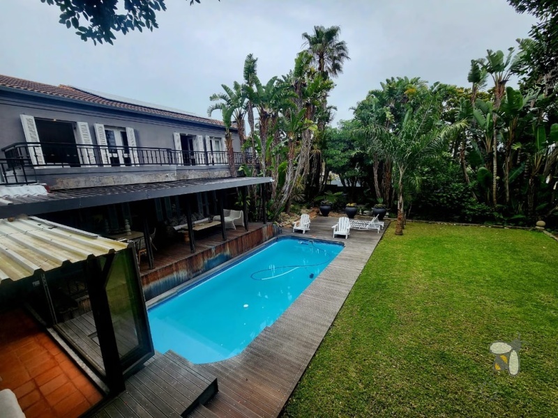 5 bedroom house for sale Linkside Mossel Bay, luxury coastal home with flatlet, house with solar and inverter system, north facing property Garden Route, en-suite bedrooms Mossel Bay.