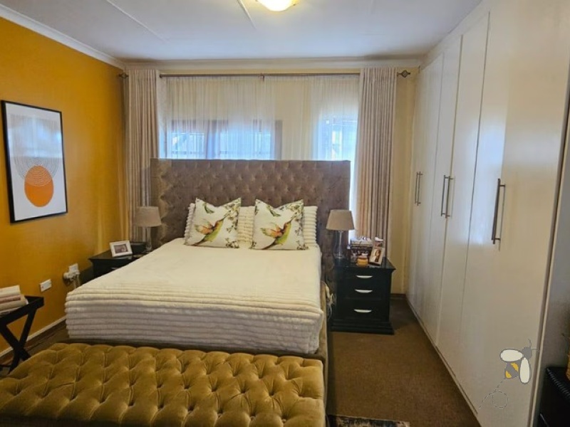 3 bedroom townhouse for rent Standerton, modern unit with inverter system, rental property with backup water tank, double garage townhouse for rent, secure family rental Standerton.