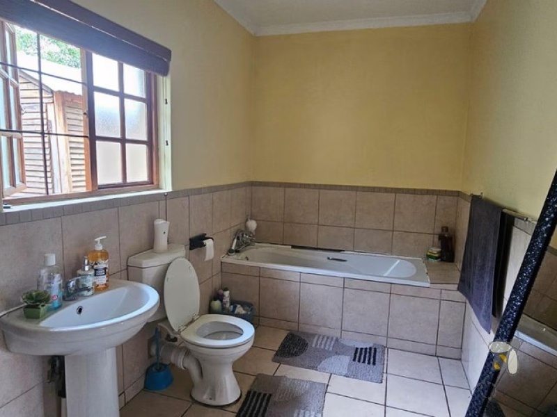 3 bedroom townhouse for rent Standerton, modern unit with inverter system, rental property with backup water tank, double garage townhouse for rent, secure family rental Standerton.