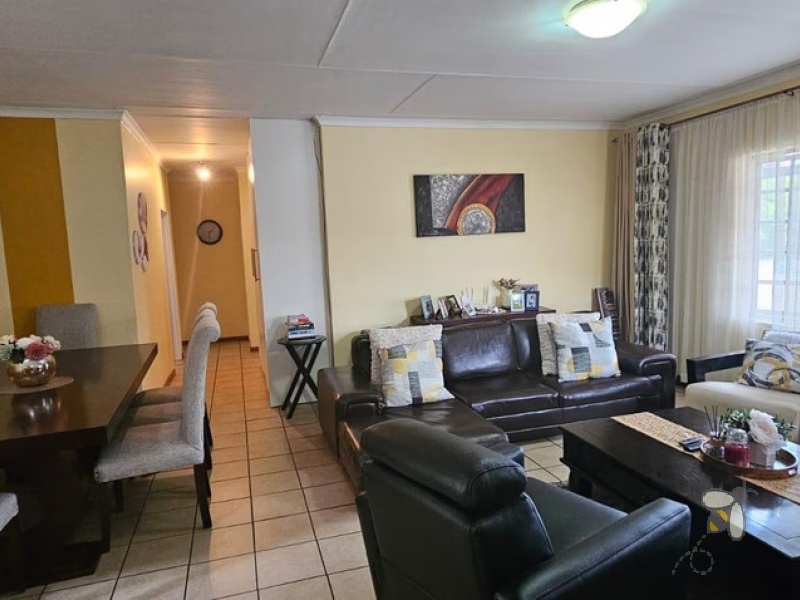 3 bedroom townhouse for rent Standerton, modern unit with inverter system, rental property with backup water tank, double garage townhouse for rent, secure family rental Standerton.