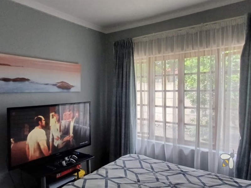 3 bedroom townhouse for rent Standerton, modern unit with inverter system, rental property with backup water tank, double garage townhouse for rent, secure family rental Standerton.