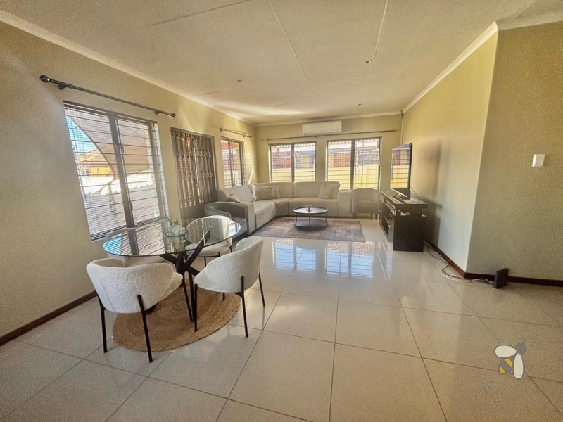 3 bedroom house to let with double garage, modern family rental with scullery, secure home with electric fencing, practical 3BR rental.