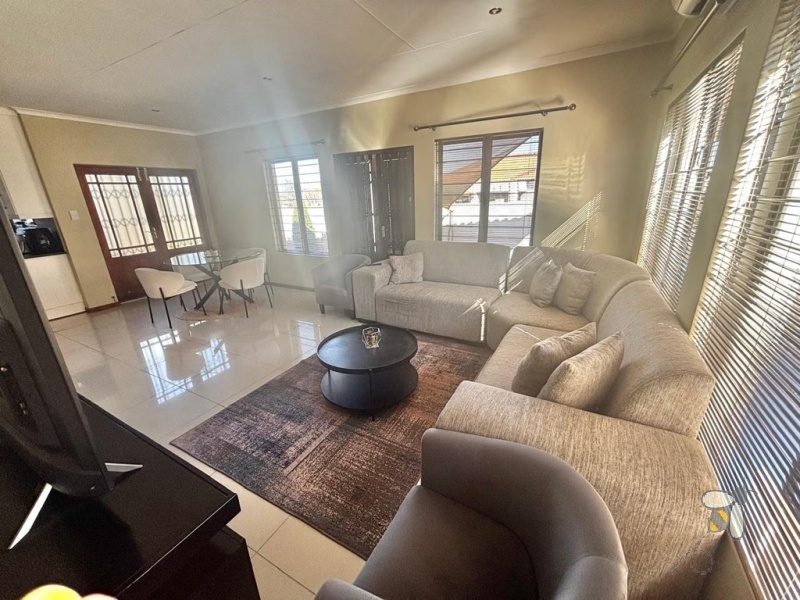 3 bedroom house to let with double garage, modern family rental with scullery, secure home with electric fencing, practical 3BR rental.