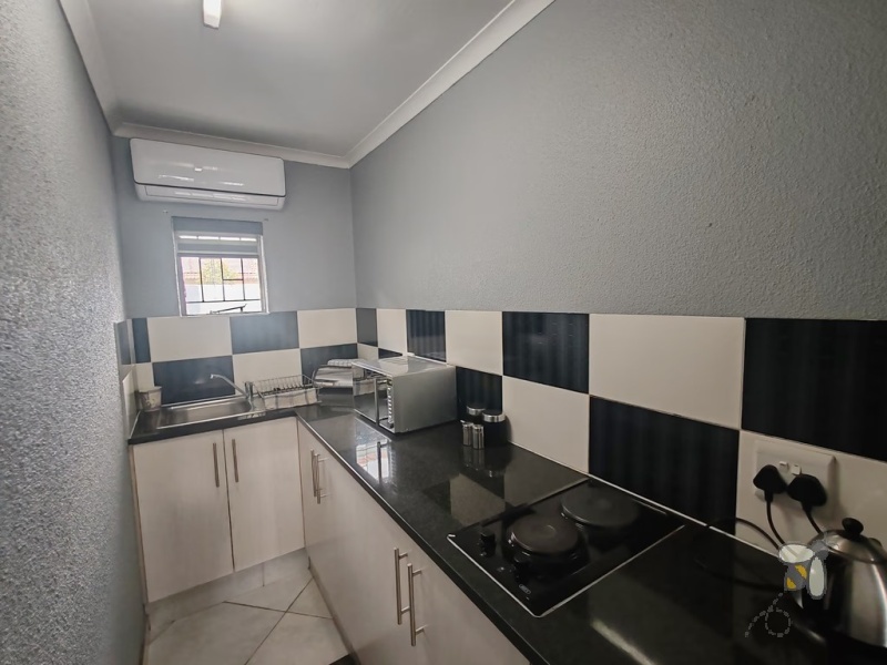 Secunda, property to rent, studio apartment, fully furnished, all utilities included, backup power, solar, JoJo tank, air conditioning, laundry service, secure living, professionals.