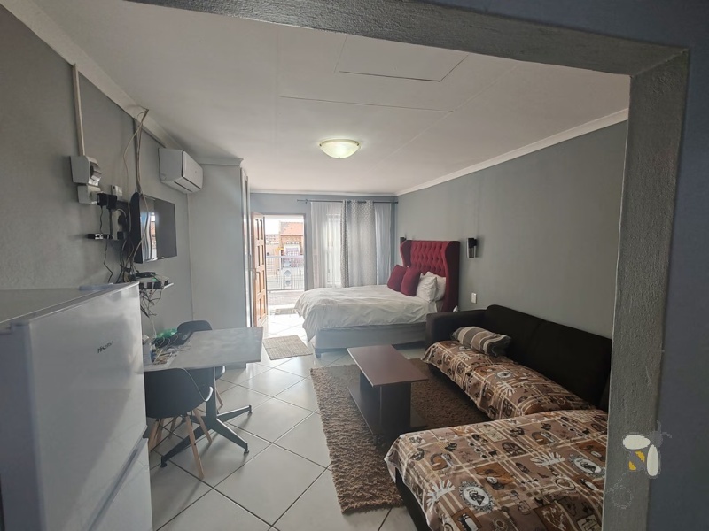 Secunda, property to rent, studio apartment, furnished room, en-suite, Ngusto Guesthouse, all utilities included, backup power, solar, JoJo tank, laundry service, professionals, private entrance.