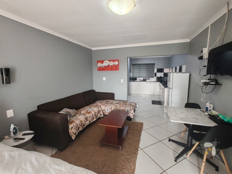 Secunda, property to rent, studio apartment, furnished room, en-suite, Ngusto Guesthouse, all utilities included, backup power, solar, JoJo tank, laundry service, professionals, private entrance.