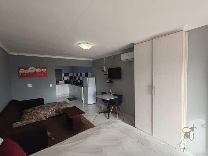Secunda, property to rent, studio apartment, furnished room, en-suite, Ngusto Guesthouse, all utilities included, backup power, solar, JoJo tank, laundry service, professionals, private entrance.