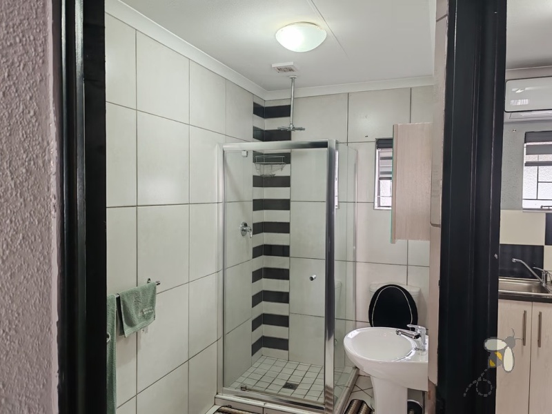 Secunda, property to rent, studio apartment, furnished room, en-suite, Ngusto Guesthouse, all utilities included, backup power, solar, JoJo tank, laundry service, professionals, private entrance.