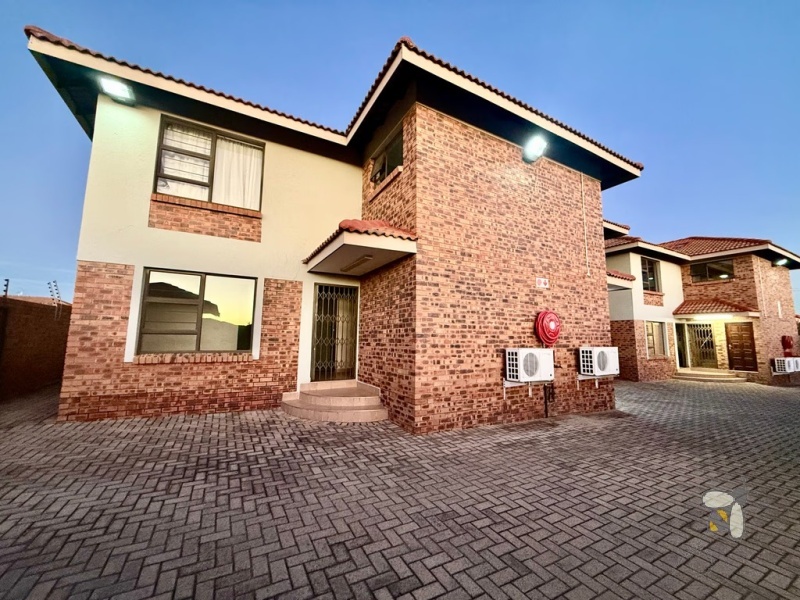 Secunda, investment property for sale, 8 unit complex, 100% occupancy, high rental income, built-in braai, prepaid utilities, multi-unit investment.