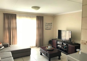 Secunda, 2 bedroom unit for sale, upmarket apartment, secure complex, modern kitchen, full bathroom, laminated flooring, garage, investment.