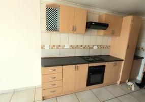 Secunda, 2 bedroom unit for sale, upmarket apartment, secure complex, modern kitchen, full bathroom, laminated flooring, garage, investment.