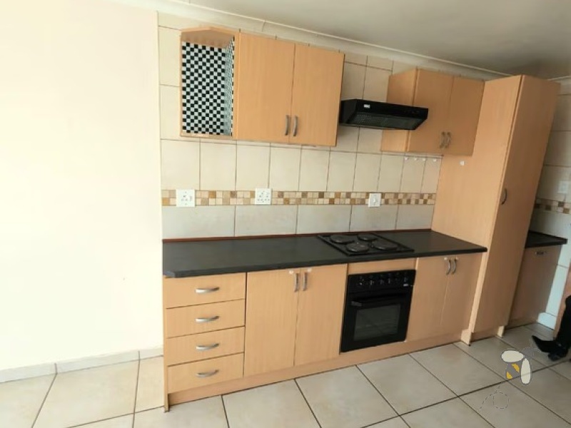 Secunda, 2 bedroom unit for sale, upmarket apartment, secure complex, modern kitchen, full bathroom, laminated flooring, garage, investment.
