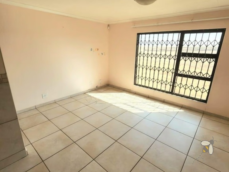 Secunda, 2 bedroom unit for sale, upmarket apartment, secure complex, modern kitchen, full bathroom, laminated flooring, garage, investment.