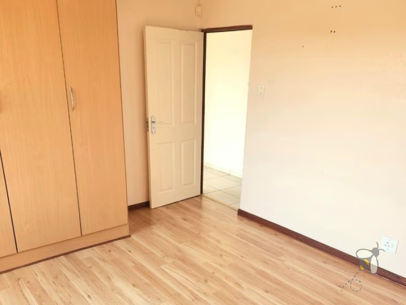 Secunda, 2 bedroom unit for sale, upmarket apartment, secure complex, modern kitchen, full bathroom, laminated flooring, garage, investment.