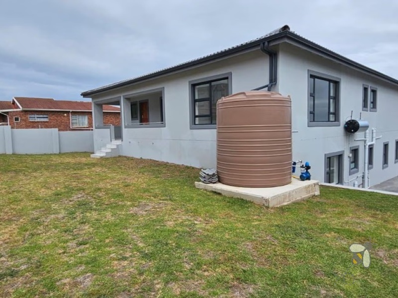 Wavecrest, 5 bedroom house for sale, double storey, sea views, open-plan living, built-in braai, gas stove, eco-friendly, water tank, modern luxury, PPRA registered.