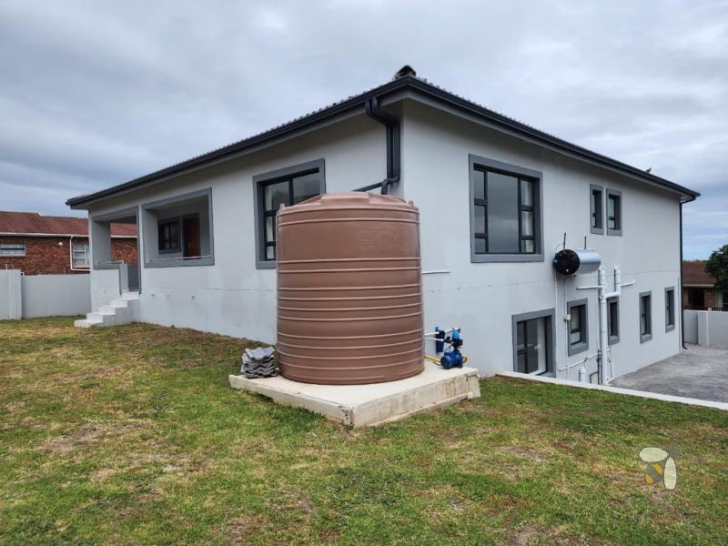Wavecrest, 5 bedroom house for sale, double storey, sea views, open-plan living, built-in braai, gas stove, eco-friendly, water tank, modern luxury, PPRA registered.
