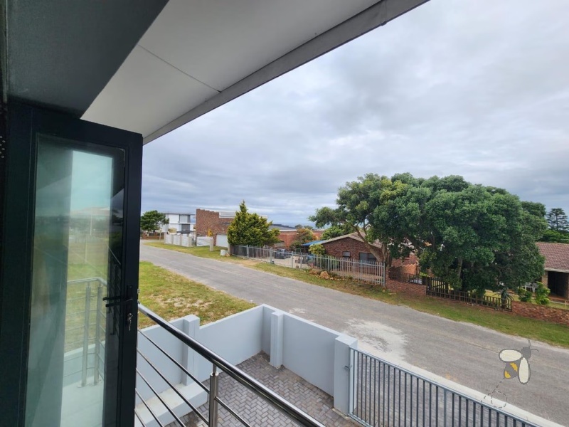 Wavecrest, 5 bedroom house for sale, double storey, sea views, open-plan living, built-in braai, gas stove, eco-friendly, water tank, modern luxury, PPRA registered.