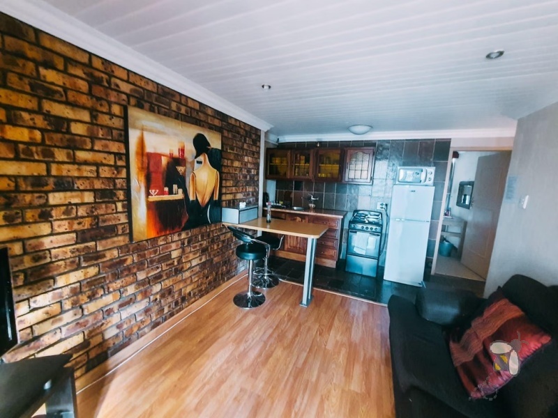 Secunda Central, Green Area, investment property, house with flats for sale, rental income, R40000, 3 bedroom, 4 flats, Duckpond view, lapa, built-in braai, income generator.