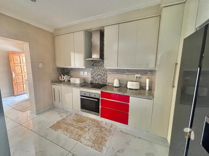 Noordrand, 4 bedroom house for sale, modern family home, swimming pool, built-in braai, open plan living, double garage, JoJo tank, upstairs lounge.