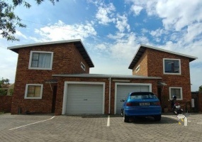 Secunda, Extension 22, townhouse complex for sale, four units, investment property, rental income, R30000, long-term lease, subdivisible stand, lock-up garages, double-story.