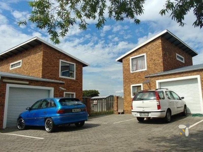 Secunda, Extension 22, townhouse complex for sale, four units, investment property, rental income, R30000, long-term lease, subdivisible stand, lock-up garages, double-story.