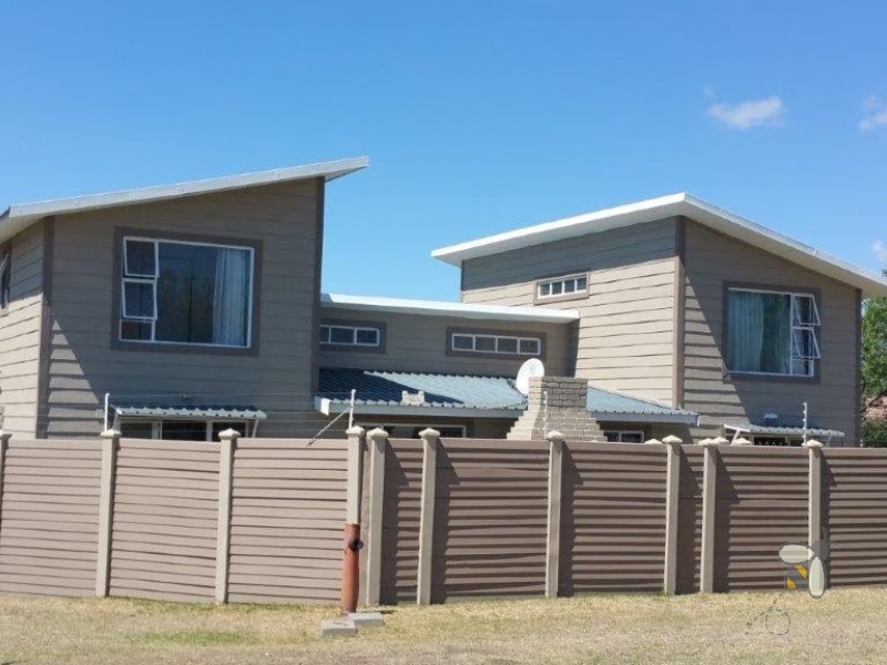 Secunda, investment property, complex for sale, rental income, R26000, multi-unit property, duplexes, single-family home, lock-up garages, well maintained.