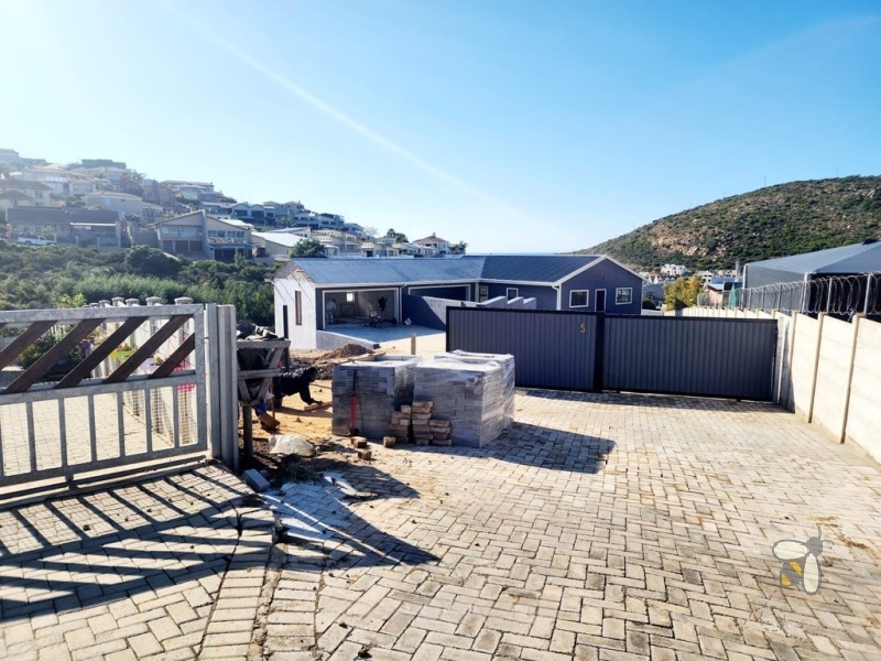 Island View Mossel Bay, 3 bedroom duet for sale, under construction, scenic views, investment property, open plan living, double garage, coastal charm, PPRA registered.