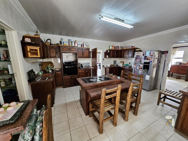 Standerton Central, 4 bedroom house for sale, freehold, solar powered pool, flatlet, rental income, generator, JoJo tanks, self-sufficient, sunroom, fire pit, study.