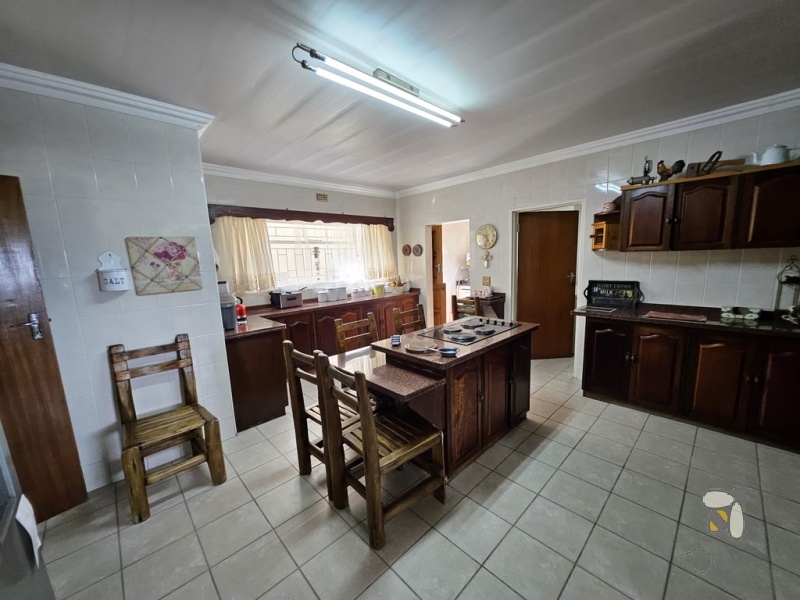 Standerton Central, 4 bedroom house for sale, freehold, solar powered pool, flatlet, rental income, generator, JoJo tanks, self-sufficient, sunroom, fire pit, study.
