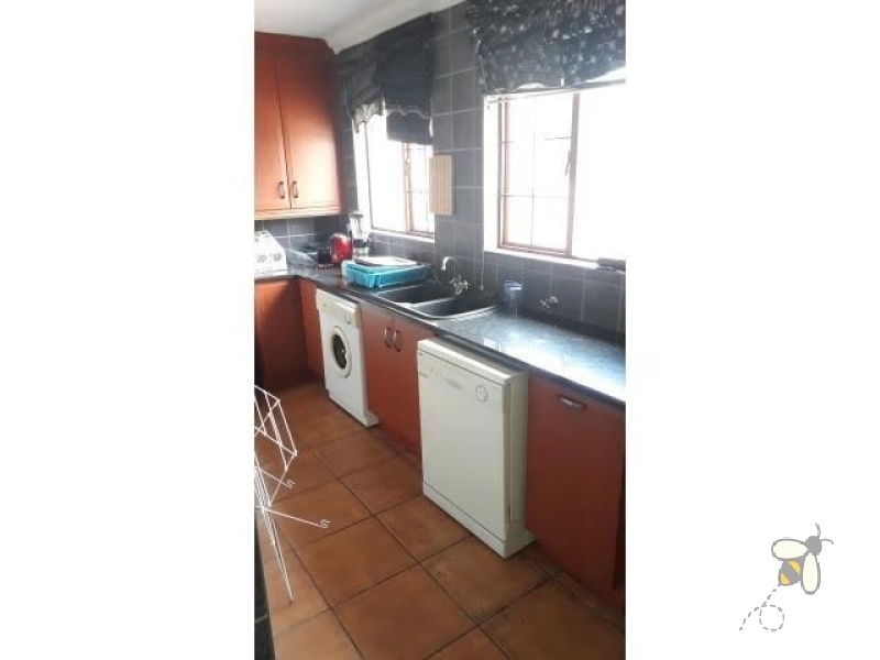 Secunda, 4 bedroom house for sale, central complex, stylish townhouse, cherry wood kitchen, granite tops, splash pool, gas braai, pet friendly, double carport, caravan parking, low maintenance.