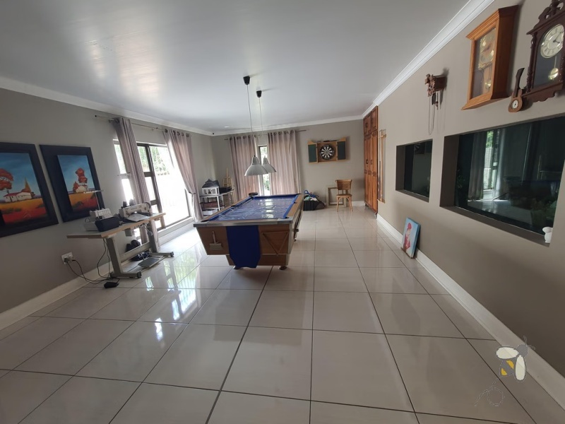 Meyerville, 3 bedroom house for sale, spectacular home, luxury entertainment, in-wall aquarium, built-in jacuzzi, built-in bar, kiaat kitchen, gas top, pizza oven, caravan carport, double garage.