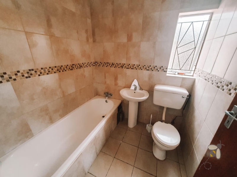 Secunda, 4 bedroom house for sale, two flats, corporate accommodation, investment property, rental income, large swimming pool, 2 bedroom flat, 1 bedroom flat, employee housing.