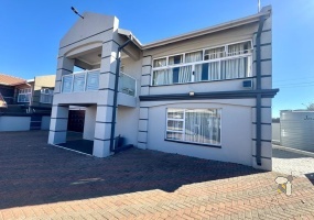 Secunda, double storey house for sale, central location, en-suite bathrooms, granite countertops, inverter system, JoJo water tank, power backup, modern kitchen, private balcony, spacious living.