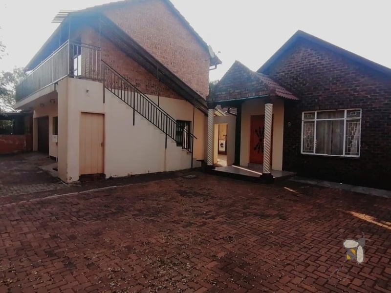 Secunda, investment property, high profit, rental income, 3 bedroom house, 3 flats, modern flats, large stand, tenant accommodation, buy-to-let, property investment.