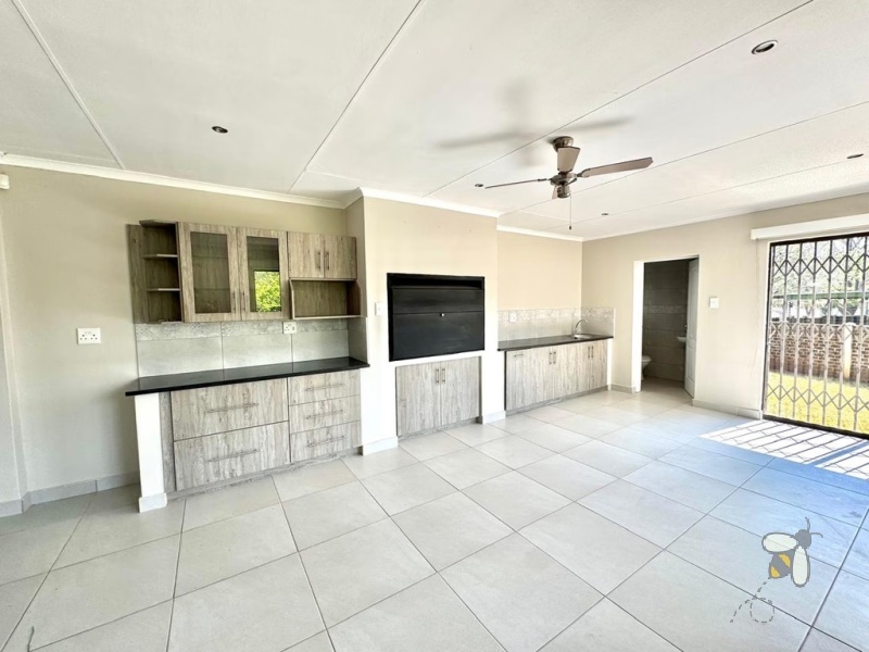 Secunda, 4 bedroom house for sale, newly renovated, green area, indoor entertainment, built-in braai, granite counters, fireplace, outside room, guest suite, double garage, prime location.